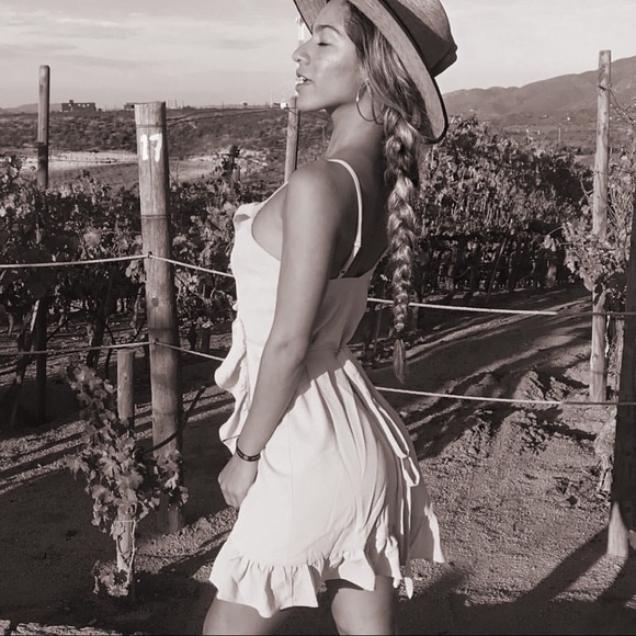 🎉CLEARANCE🎉 White Ruffled Wrap Mini Dress - Picture 3 of 5